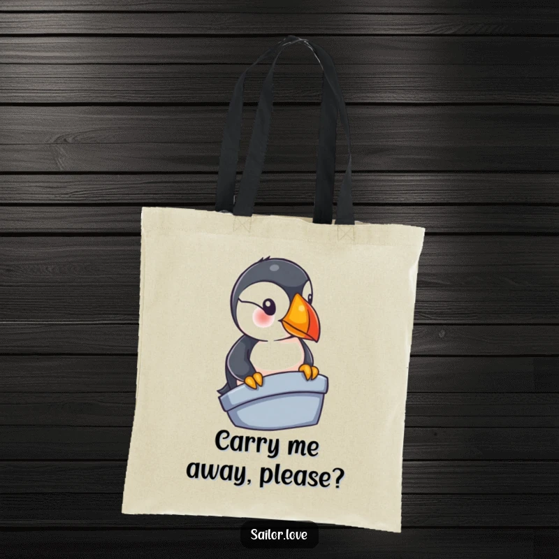 Funny puffin tote bag featuring a curious bird peering from a boat's edge, ideal for nautical fans and lovers of funny animal art.